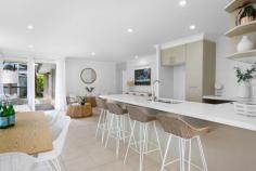 23 Marks Drive Varsity Lakes QLD 4227 $1,489,000 Carefree, Sunlit and Supremely Central Family Haven Seeking a carefree and convenient place to call home? Set across a single level in a central location, this light and bright beauty is the warm, welcoming and low-maintenance haven you've been waiting for. Occupying a generously sized 910m2 block opposite Sindone Family Park and Varsity Lake, settle in for some relaxation in a choice of two separate, spacious and sunlit living areas. A dining zone is nestled between these, complemented by a tasteful kitchen, offset with stone benches, premium appliances and a handy breakfast bar for meals on the run. Growing families will appreciate the four well-proportioned bedrooms, led by the master suite featuring dual built-in robes and a stylish ensuite. Servicing the remaining bedrooms is a light-filled main bathroom, complete with shower, bath, vanity and separate toilet. Outdoors, a slice of paradise beckons. Get set for an endless summer with a heated magnesium pool wrapped with non-slip Travertine tiles, while manicured lawns provide a place for kids and pets to play, trimmed with established gardens that evoke tropical tranquillity. If you love to entertain, that's catered for too, with a covered alfresco terrace, plus parking is plentiful thanks to a double garage and ample off-street parking behind secure fencing. Boasting a supremely handy location, make the most of being across from lakeside parklands and within 6 minute's drive of three popular schools. Shopping is easy too, with Stockland Burleigh Heads approx. 7 minutes by car, or soak up the sun, sand and surf of Burleigh in under 10 minutes. With all you need and more, there's no place else you'd rather be! Inspect today. House Features: Fresh, light-filled single level sanctuary Tasteful and tidy kitchen offset with stone benches, induction cooktop, Bosch oven, breakfast bar plus a stainless steel tap and double sink Two separate, spacious and light-filled living areas flank either side of a central dining zone Master suite features dual built-in robe and a stylish ensuite Three bedrooms with built-in robes Light and bright main bathroom includes a shower, bath, vanity and separate toilet Covered alfresco entertaining terrace Heated magnesium pool, trimmed with non-slip Travertine tiles Manicured lawns and established tropical gardens Laundry with ample storage Double garage Split system air-conditioning Ceiling fans Property Features: Supersized 910m2 block Wide electric main entry gate Second manual gate opening onto a concrete pad, perfect for boat, trailer or caravan parking New NBN connection Location: Opposite Sindone Family Park and Varsity Lake Approx. 2 mins to Frascott Park Approx. 5 mins to Caningeraba State School Approx. 6 mins to Varsity College Primary Campus Approx. 6 mins to Marymount College Approx. 7 mins to Stockland Burleigh Heads Approx. 9 mins to Burleigh Beach Approx. 12 mins to Palm Beach Approx. 18 mins to Gold Coast Airport Approx. 20 mins to Surfers Paradise