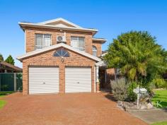 15 Wombeyan Ct Wattle Grove NSW 2173 This beautifully presented split level home is the perfect sanctuary for growing family. With a thoughtful layout this property is ideal for those seeking space, comfort, and style. Main features Include: Spacious Bedrooms: A well-designed 4-bedroom, 3-bathroom home where all bedrooms feature built-in wardrobes. The master suite adds a touch of luxury with a private ensuite. Multiple living spaces: Enjoy versatile living with formal and informal areas, plenty of room for the whole family to relax or entertain. Gourmet Kitchen: A clean, functional kitchen with ample storage for the family chef. Outdoor Entertaining Area: A large alfresco space with an outdoor kitchen and gas cooktop, perfect for gatherings. Low Maintenance Gardens: Beautifully landscaped with established greenery and easy-care plants. Additional Features: High ceilings, air conditioning, tiled floors downstairs, floorboards upstairs, fully tiled bathrooms, and a large cellar. Double garage with internal access and double brick downstairs. Balancing convenience with family-friendly design, this home is an exceptional find.