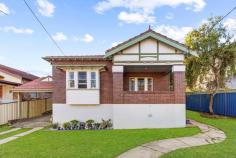 23A Gallipoli Street Hurstville NSW 2220 Set in an elevated position and in a quiet tree lined street, this full brick home is ideal for any young family or downsizer looking for a single level home in an ultra convenient location. Full of character and charm, the home has been tastefully updated with high ornate ceilings, polished timber floors and low maintenance yard that's ideal for entertaining. Located within close walking distance to Hurstville Station, Shops and Schools. Property Features: Separate lounge and dining rooms Light filled rooms, stain glassed windows, picture rails & air-conditioning Three large bedrooms, master with built-in and ensuite Modern kitchen with gas cooking and stone bench tops Side access for multiple vehicles to carport