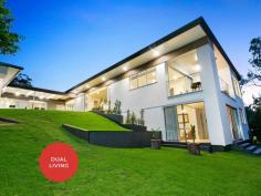 26 Ladds Ridge Road Burleigh Heads QLD 4220 This sprawling six-bedroom resort-style retreat delivers space, versatility, and luxury living in one of the Gold Coast's most coveted locations. Set amongst nature on a huge 1534m2 block, this dual-living abode features epic amenities including a pro skate bowl and a jetted swim-in-place spa. Capturing the essence of Burleigh Heads cool yet luxurious lifestyle, this home is ideally positioned just minutes from the beach and renowned dining scene this area is known for. More than just a home, thoughtful design elements allow unique flexibility, with options for both dual-living and even tri-living configurations. Enjoy a spacious five-bedroom luxury abode with an additional one-bedroom unit downstairs, or effortlessly close partition doors to divide the primary residence into two separate homes: a three-bedroom and a two-bedroom residence, still with the one-bedroom unit positioned downstairs to the rear of the home, overlooking the spa. The overall design is filled with light and texture, inspired by the natural surroundings. The heart of the home is an expansive primary kitchen that flows seamlessly between the open-plan dining and living areas and the covered alfresco space. Outfitted with a vast island bench with breakfast bar, sleek servery window, two Miele ovens, fully integrated appliances, and abundant storage, this culinary space is a dream for the modern entertainer and busy family alike. True to its commitment to versatile, future-thinking living, the primary residence of this home offers two full kitchens, primary and secondary master bedrooms, and rooms that can function as either a bedroom or media room. The primary master suite is a true resort-style haven, with an oversized walk-in wardrobe, luxurious ensuite, and spacious private balcony. Surrounded by glazing to welcome the surrounding natural outlook in, this suite is a divine space that encourages true relaxation. Every inch of this home exudes style, with a modern, neutral colour palette accented by natural textures that blend effortlessly with the outdoor environment. The property's generous block includes beautifully landscaped gardens, a spacious yard, and phenomenal amenities, from a jetted swimming spa to a private skate bowl, catering to both fun and relaxation for all ages. The attached one-bedroom self-contained unit is positioned downstairs at the rear of the home, overlooking the spa and green spaces. It features its own bedroom and living zone, a full kitchen, walk-through wardrobe, and ensuite, all opening onto the lush backyard. This self-contained living space is ideal for guests, extended family, or as an income-generating rental. Behind this unit, an additional secure storage area is protected by a 12-point steel security door, ensuring peace of mind for your most treasured belongings. Whether you're seeking a large family home, intergenerational living, or even an additional income opportunity, this Burleigh Heads retreat is the ultimate luxury lifestyle choice. Kids and adults alike will fall in love with the outdoor amenities, while the spacious interiors offer room to relax, work, and entertain—all in one of the Gold Coast's most sought-after suburbs. FEATURES - PRIMARY RESIDENCE 5 bedrooms, 3 bathrooms, 2 kitchens, with flexible layout that can separate into dual-living or tri-living layouts Luscious 1534m2 fully fenced block Kitchen with Miele steam combi oven, pyrolytic oven, fully integrated fridge/freezer, dishwasher, and wine fridge space Separate living and dining zones filled with natural light Master suite with expansive walk-in wardrobe, ensuite, and private balcony overlooking the backyard Secondary master with walk-in wardrobe and two-way bathroom Third bedroom can function as a media room, with two additional bedrooms at the front Study/office with separate entry Split system air conditioning throughout main living zones and master suites High-end design elements throughout, including LED feature lighting Covered alfresco area with dual fans and a servery window connecting to the kitchen Built-in front yard area set behind a privacy fence, with steps up to secure front gate and intercom Double carport with secure remote access garage door for two cars Additional driveway parking behind remote access gate for 2 cars, or one car plus a boat/caravan FEATURES - ONE BEDROOM UNIT Open-plan bedroom, living, and dining area Walk-through wardrobe and spacious bathroom Full kitchen with oven, induction cooktop, and dishwasher Under-house storage secured by a concealed 12-point steel security door FEATURES - OUTDOOR Large yard with low-maintenance landscaping and established trees Jetted swim spa with steps and cover 22-meter skate bowl, 3-6 meter depth 13.5kW solar with generator wiring High-pressure 25mm water meter Six water tanks totalling approx 5000L Secure, temperature controlled storage shed Garden shed LOCATION Stockland Burleigh Heads - Approx 5 mins St Andrews Lutheran College - Approx 6 mins James Street Burleigh Heads - Approx 7 mins Burleigh Beach - Approx 8 mins Burleigh State School - Approx 9 mins Robina Town Centre - Approx 14 mins Gold Coast Airport - Approx 16 mins Brisbane Airpoirt - Approx 1hr 8mins