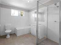 10 Gladstone Street EIMEO QLD 4740 This is more than just a house-it's your chance to claim a slice of the idyllic Eimeo lifestyle, where every day feels like a holiday. Set in a quiet cul-de-sac, this high-set gem is a canvas waiting for your personal touch. It's neat and tidy spaces are filled with charm, but the real magic is the potential. The open-plan layout greets you with an air of possibility, from the warmth of timeless wooden floors in the lounge to the timber-look kitchen, perfect for whipping up family feasts or impromptu beach picnic spreads. With three cozy bedrooms, the master boasting a spacious wardrobe, and a crisp white-tiled bathroom that's fresh and functional, the upstairs space is a sanctuary. Internal stairs connect you to a wealth of storage below-a place for hobbies, tools, or a future retreat. And then, there's the yard-a sprawling canvas, just begging for a sparkling pool, a workshop for weekend projects, or a garden alive with tropical blooms. With convenient side access, the dream is yours to design. This isn't just a home; it's an invitation to join a vibrant beachside community. Spend your Fridays at the Eimeo Surf Club, sharing laughs and stories with the locals. Or sip a cold drink at the iconic Eimeo Hotel, where the views are nothing short of breathtaking. Homes in this prized location are rare and fleeting-don't wait too long, or you might miss the chance to make this coastal dream your reality.