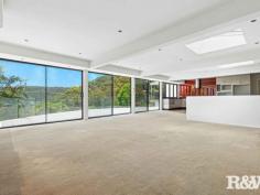 40 Sandstone Cres Tascott NSW 2250 This home is architecturally designed to take full advantage of the panoramic views of Brisbane Waters and the surrounding National Park, making it a perfect haven for those who love to entertain. Featuring expansive floor-to-ceiling windows and doors throughout, the home is immersed in natural light and creates a seamless flow between the indoor and outdoor living spaces. With some TLC this could become a truly impressive home. Located in one of Tascott's most sought-after streets, this home is just a stone's throw from the bus service, Tascott Train Station, the local park, Locomotive coffee shop, waterfront, and shared bike path. Whether you hop in the car or catch the train, you'll be just minutes away from all your essential amenities, including shops, medical and beauty services. Features to note: - The open-plan kitchen, lounge, and dining area is spacious and thoughtfully designed to capture the stunning views. Skylights and floor-to-ceiling sliding doors seamlessly connect the interior to the entertaining area. This space is air-conditioned and features stylish downlights throughout, creating a comfortable and inviting atmosphere all year round. - The oversized, modern kitchen offers plenty of bench and storage space, with a large breakfast bar and a convenient serving window. It’s equipped with high-quality stainless steel appliances, including a dual sink, induction cooktop, Miele rangehood, Bosch oven, and Bosch dishwasher. - Oversized double garage with automatic roller door internal access to the home and outside turning bay. - The downstairs level boasts a spacious room with floor-to-ceiling glass windows, offering versatility as a fourth bedroom, additional lounge area, home gym or a home office. - Downstairs you will also find a large bathroom and combined laundry with, vanity, shower, toilet and laundry sink. - Upstairs you will find 3 bedrooms all with built in wardrobes and bay style windows. You will also find the main bathroom featuring a shower, toilet, bathtub and vanity. - To the back of the home you will find rear access and a levelled yard, perfect for pets or children to run around in.
