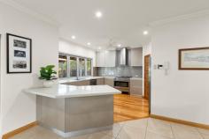 28 Sanctuary Road Cable Beach WA 6726 $1,400,000 This stunning builder's own home, a true testament to craftsmanship, is being offered for sale for the very first time. Designed and constructed with the highest quality materials and an exceptional attention to detail, every element of this property has been carefully considered to create a space that is both luxurious and functional. From the moment you arrive, you will be captivated by its impressive street appeal. Towering Indian mast trees line the front of the property, complemented by a beautifully rendered front wall that ensures privacy and security, giving the home an exclusive and welcoming presence. As you approach the entrance, you are greeted by a magnificent Balinese-style thatched portico, offering an exotic touch that immediately sets the tone for the rest of the home. The solid teak entry doors open to reveal a paved front courtyard, complete with a stunning stone fishpond that creates a tranquil ambiance. This serene setting is just a taste of the peaceful retreat that awaits inside. Step through the grand bifold doors and into the expansive open-plan living area, where natural light pours in from every angle, creating a warm and inviting atmosphere. The seamless connection between the indoor and outdoor spaces enhances the feeling of openness, allowing gentle breezes to flow through the home, further enhancing the tropical lifestyle. The heart of this home is the luxurious chef's kitchen, featuring high-end appliances and a bifold servery that opens up to the alfresco area, making it ideal for entertaining. Whether you're preparing a gourmet meal or hosting guests, this kitchen offers both style and practicality. The main house offers three spacious bedrooms, each designed to provide the utmost comfort and privacy. The opulent master suite is a true sanctuary, offering a retreat-like atmosphere with ample space, a walk-in robe, and a beautifully appointed ensuite. The living areas are equally impressive, with an expansive layout that effortlessly flows into the outdoor entertaining spaces, creating a harmonious connection between the home and its surroundings. From the living area, massive bifold doors open to reveal a large alfresco deck, which is an entertainer's dream. The polished timber floors and gloss wood-lined ceilings create an elegant and inviting space, while the view of the stunning concrete pool, surrounded by elegant granite pavers, adds a sense of luxury. The pool area is a private oasis, with a Balinese-inspired gazebo offering the perfect spot to relax and enjoy the tranquil surroundings. The property also features a separate guest pod, offering a luxurious bedroom and a beautifully designed ensuite, ensuring that visitors or family members can enjoy complete privacy and comfort. In addition, there is an external laundry and a guest WC conveniently located off the deck, ensuring convenience and ease of access for both residents and guests. Situated on the edge of the Cable Beach Tourist precinct, this property offers an unparalleled location. Just 300 meters from the renowned Spinifex Brewery and the award-winning Wharf Restaurant, it's perfectly positioned for those who appreciate world-class dining and entertainment. The golden sands of Cable Beach, with its crystal-clear waters and breathtaking sunsets, are just 1km away, offering easy access to one of the most iconic beaches in the world. This home is more than just a place to live; it's a lifestyle. The unique combination of luxury, tropical living, and exceptional craftsmanship makes this property a rare find. With its attention to detail, seamless integration of indoor and outdoor spaces, and unbeatable location, this is an opportunity you won't want to miss. Whether you're looking for a private sanctuary or a place to entertain family and friends, this stunning home offers it all.