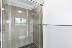 77 Corfield Street Point Vernon QLD 4655 $1,295,000 - $1,350,000 This thoughtfully renovated, character home offers warmth, charm, and striking street appeal and has been maintained in a way to preserve its original charm whilst catering to all the modern comforts you could desire. As you enter this character filled home you will be greeted with a clever combination of yesteryear and a classic, contemporary renovation which will surprise at every turn. The charming interior showcases a well thought out combination of original character features and stylish, modern updates. The property features include high ceilings throughout, original hardwood timber Fraser Island timber flooring, tongue and groove wall panels, decorative fretwork and stained glass and has been meticulously restored for the new owners to move in and enjoy. Positioned only a short 250m from pristine Point Vernon foreshore and Esplanade, this coastal inspired home has been thoughtfully constructed to create balance and harmony with a strong focus on comfortable beachside living. Features include: Beautiful character home which has been thoughtfully renovated throughout Versatile wrap around verandah which overlooks pool and adjoins main living via French doors Open plan living, dining and kitchen with air-conditioning Quality kitchen with stone benchtops, island bench, walk in pantry, dishwasher and 90cm Smeg freestanding electric oven with gas cooktop Separate bar area which adjoins a second living zone with bay window and built in seating Downstairs bedroom with built in wardrobe Spacious internal laundry room with external entry near garage - ideal for use as a mudroom or drop zone Bathroom to service lower level Timber internal staircase to upper level Upper central activity zone or study area Master bedroom with air-conditioning, ensuite bathroom and walk in wardrobe/ dressing room Three additional bedrooms upstairs, all with direct balcony access via French doors, air-conditioning and built in wardrobes Family bathroom upstairs with separate toilet Large walk-in linen cupboard Upstairs wrap around verandah which mirrors the lower level and captures ocean glimpses Double garage at rear with automatic lift door Sparkling inground magnesium pool Solar hot water Easy care, established gardens 660m2 fully fenced allotment with side access Beach access is only a few moments' walk from your door, where you can enjoy peaceful walks along the coast. Local restaurants, cafes and shops are within a short distance. An easy drive takes you to all other major amenities, where you have access to public & private hospitals, Hervey Bay Airport, Stockland Shopping Centre and much more.