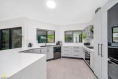 6 Whela Close Bentley Park QLD 4869 $698,000 Presenting 6 Whela Close, Bentley Park. Discover this recently renovated, contemporary home which perfectly blends family living with convenience in a tranquil setting. Set on a 684m² block, it features a spacious open-plan layout designed for functionality, relaxation, and entertaining. Nestled in a quiet close in the highly sought-after Silkwood Ridge Estate, the cool tropical design is ideally suited to its location, the climate, and lifestyle we take for granted here in Tropical North Queensland. The quality of the recent renovations are evident from the minute you step inside the entry, which opens onto a spacious combined living and dining area. The kitchen area is the hub of the home, complete with quality appliances, large fridge space, granite sink and gesture activated tap and rangehood. Triple sliding doors open from the living area onto the tiled rear patio and backyard, creating a seamless blend of indoor-outdoor living. Outdoor living spaces provide tranquility with mountain views and no rear neighbours. With an abundance of natural light streaming in through large windows, and neutral palette, the living spaces provide the perfect canvas to create your own oasis. The four well-appointed bedrooms can comfortably fit king size beds and include built-in storage. The master benefits from a walk in robe and a recently renovated modern en-suite including floor to ceiling tiling, walk-in shower with frameless shower screen, and a sleek in-wall cistern. Beat the cost of living with a 10 kilowatt solar system and 25 x 390 watt panels to maximise solar production. A battery ready hybrid inverter has been installed to allow further reduction of energy costs and avoid disruption to power supply. Additional property highlights continue: Split system air conditioning throughout Tiled throughout Security screens Internal laundry with built-in storage Over sized double car accommodation with internal access 2.7m ceilings Wide side access through to backyard Low maintenance gardens Fenced to backyard Garden shed FTTP connection in place Gas hot water and cooktop Energy efficient lighting Established chefs gardens Plenty of space for the growing family to spread out, just 15km from the Cairns Central Business District and within easy distance of sporting grounds, schools, medical facilities, and a short drive to the Coles shopping centre at Edmonton.