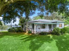 57 Jorgensens Ln Brooklet NSW 2479 Nestled on a picture perfect 2.01 hectares, this rustic farmhouse exudes warmth and tranquility, set against the breathtaking backdrop of Brooklet’s natural beauty. Offering both seclusion and convenience, it's just minutes from the vibrant Newrybar Village and a short drive to Bangalow and Byron Bay. Private 2.01 hectare retreat in the heart of Brooklet, 20 minutes to Byron Bay Sunkissed farmhouse with picture windows, timber floors, high ceilings, and a wraparound verandah Spacious interiors offering three bedrooms, most with built-in robes, plus a separate study Modern kitchen with premium appliances, ideal for entertaining Horse lover’s paradise with expansive stables, well maintained paddocks, and space for an arena Separate studio with outdoor w/c perfect for guests Lush tropical gardens with idyllic views A huge garage offers space for cars, a boat and equipment Stellar location just 3 minutes to Harvest Newrybar, 8 minutes to Bangalow, 10 minutes to Broken Head beach and 20 minutes to Byron Bay and Ballina Airport. This exceptional property is a rare find, offering a harmonious blend of country charm and modern convenience, all set within the seductiveness of the hinterland, perfect for those seeking a peaceful lifestyle.
