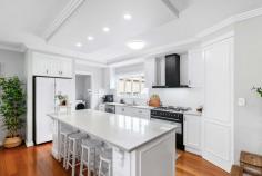 77 Corfield Street Point Vernon QLD 4655 $1,295,000 - $1,350,000 This thoughtfully renovated, character home offers warmth, charm, and striking street appeal and has been maintained in a way to preserve its original charm whilst catering to all the modern comforts you could desire. As you enter this character filled home you will be greeted with a clever combination of yesteryear and a classic, contemporary renovation which will surprise at every turn. The charming interior showcases a well thought out combination of original character features and stylish, modern updates. The property features include high ceilings throughout, original hardwood timber Fraser Island timber flooring, tongue and groove wall panels, decorative fretwork and stained glass and has been meticulously restored for the new owners to move in and enjoy. Positioned only a short 250m from pristine Point Vernon foreshore and Esplanade, this coastal inspired home has been thoughtfully constructed to create balance and harmony with a strong focus on comfortable beachside living. Features include: Beautiful character home which has been thoughtfully renovated throughout Versatile wrap around verandah which overlooks pool and adjoins main living via French doors Open plan living, dining and kitchen with air-conditioning Quality kitchen with stone benchtops, island bench, walk in pantry, dishwasher and 90cm Smeg freestanding electric oven with gas cooktop Separate bar area which adjoins a second living zone with bay window and built in seating Downstairs bedroom with built in wardrobe Spacious internal laundry room with external entry near garage - ideal for use as a mudroom or drop zone Bathroom to service lower level Timber internal staircase to upper level Upper central activity zone or study area Master bedroom with air-conditioning, ensuite bathroom and walk in wardrobe/ dressing room Three additional bedrooms upstairs, all with direct balcony access via French doors, air-conditioning and built in wardrobes Family bathroom upstairs with separate toilet Large walk-in linen cupboard Upstairs wrap around verandah which mirrors the lower level and captures ocean glimpses Double garage at rear with automatic lift door Sparkling inground magnesium pool Solar hot water Easy care, established gardens 660m2 fully fenced allotment with side access Beach access is only a few moments' walk from your door, where you can enjoy peaceful walks along the coast. Local restaurants, cafes and shops are within a short distance. An easy drive takes you to all other major amenities, where you have access to public & private hospitals, Hervey Bay Airport, Stockland Shopping Centre and much more.