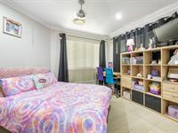 22 Grosskreutz Avenue MARIAN QLD 4753 $639,000 Located just 20 minutes from Mackay City Gates, this beautiful and modern family home at 22 Grosskreutz Avenue, Marian, is ready to welcome your family. Featuring all the conveniences a family needs, including two bathrooms, two car garage with internal access, and multiple living areas with space for a media room or office, this home truly ticks all the boxes. The four bedrooms are thoughtfully appointed with ceiling fans, air conditioning, and built-in wardrobes. The main bedroom boasts a walk-in robe and a private ensuite, complete with a luxurious his-and-her shower. The large, modern kitchen is both stylish and functional, offering ample storage and bench space. The generous breakfast bar is perfect for meal preparation and homework, comfortably accommodating the demands of busy family life, this space opens out onto a great size entertainment area that over looks the yard. Set on a 706m² block, this property provides plenty of room for the whole family to enjoy. A single-bay shed with side access adds extra storage or workspace options, making it ideal for a variety of uses. The spacious yard offers endless possibilities for outdoor fun and entertaining. Marian is a growing community, and it's easy to see why. The township is close enough to Mackay City for work and urban amenities, yet far enough to maintain its charming country feel. With everything you need close by, including a major supermarket, a doctor's surgery, and schools, Marian provides the perfect balance of convenience and lifestyle.