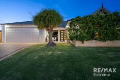 2 Ginsburg Turn Tapping WA 6065 $900,000 This stunning 4-bedroom, 2-bathroom masterpiece is simply in a league of its own! Lovingly renovated & improved by the current owners to create a home that provides space & comfort for all the family; here is your chance to snap up a property that is ready to move straight into & enjoy. Features & benefits include: • Timeless front elevation with established landscaping • Verandah leading to double door entry • Crimsafe security screens • Entrance hall • Master bedroom suite with twin walk-in robes, ceiling fan, reverse cycle a/c, and luxury ensuite with twin vanities, double showers & separate WC • Home office / bed 5 / nursery (currently utilised as a home beaty salon) with reverse cycle a/c & sink with hot & cold water • Amazing home theatre with ‘star’ fibre optic ceiling; screen & projector included • Open plan family & meals areas with ceiling fan & double sliding doors to alfresco • Stunning kitchen with stone benchtops, feature lighting, walk in pantry, shoppers’ access from the garage & stainless-steel appliances including 900mm oven, gas cooktop, extractor & dishwasher • 3 further bedrooms all with double sliding door robes, ceiling fans & 2 with reverse cycle a/c • Family bathroom with shower, bath & vanity • Renovated laundry with walk in linen press, feature LED lighting, WC & sliding door to outside with crimsafe security screen Outside features: • Amazing alfresco with honed, exposed aggregate flooring, built in outdoor kitchen with BBQ & sink, electric heater, ceiling fan, built in speakers & ducted evaporative a/c & café blinds • Sparkling below ground pool with honed, exposed aggregate, outdoor shower & frameless glass pool fencing • Established, low maintenance gardens with lawn area, citrus trees, palms & frangipanis • Garden shed Extra Features: • Skirting boards • CCTV • Drop down attic ladder • Bore reticulation • Evaporative air conditioning • Double remote-control garage with extra height for 4WD’s • Large 606sqm corner block Located close to parks, schools, transport links & all local amenities, buyers are urged to act quickly to secure this stunning property.