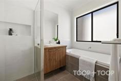 16 Gaynor Ave Paralowie SA 5108 Are you a first home buyer looking to save on stamp duty (subject to eligibility)? Discover the epitome of refined living at 16 Gaynor Avenue, this brand new Metricon masterpiece effortlessly combines sleek design with inviting warmth, offering an ideal haven for those seeking both comfort and style. As you step through the entrance, you'll appreciate the thoughtful layout as the spacious open-plan living area seamlessly integrates the kitchen, dining, and living spaces. The home is bathed in an abundance of natural light streaming through the large windows that also frame pleasant outdoor views. The kitchen is a chef’s dream, boasting a spacious walk-in pantry, high-end 900mm wide oven, ample bench space and exquisite stone benchtops that add a touch of elegance. This home features four well-appointed bedrooms, each thoughtfully designed with large built-in robes providing ample storage. The primary suite serves as a private retreat, boasting a spacious ensuite and a generous walk-in robe. Meanwhile, the centrally located main bathroom enhances the home’s sense of tranquility and style, showcasing contemporary fixtures throughout Outside, a fully landscaped garden with an irrigation system provides a serene and picturesque setting, perfect for entertaining. The expansive pergola is ideal for hosting gatherings for any occasion, or enjoying peaceful evenings under the stars. Practicality meets style with a secure garage offering internal access, while reverse cycle air-conditioning throughout ensures year-round comfort, enhancing the overall living experience. This opportunity is perfect for first home buyers looking to save on stamp duty (subject to eligibility), downsizers looking for a flat footprint, families looking to upsize or the savvy investor. This home marries function with a fresh, contemporary aesthetic, creating an inviting space that is as beautiful as it is liveable! Key Features: - Brand new 2024 Metricon build -Torrens Title - Fully landscaped garden with irrigation system - Zoned for Paralowie High, Settlers Farm Primary and close to other quality schooling options -Within close proximity to an array of public transport options For Sale Contact Agents Property Information Built 2024 Land Size 300.00 sqm approx. Council Rates $1244.10pa ES Levy $99.70pa Water Rates $165.55pq