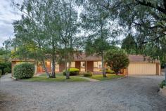 65 Alicudi Avenue Frankston South VIC 3199 $1,785,000 - $1,950,000 ~ Spacious family living designed with trade appeal ~ Pairing the perfect light-filled layout for growing families with private outdoor space and functionality, this established allotment of approximately 2,746sqm keeps everyone happy with multiple living zones, a resort-style swimming pool and expansive shedding perfect for trade-based business. Peacefully positioned within one of Frankston South's most sought-after avenues with direct access to Frankston Nature Conservation Reserve, the home's private frontage keeps features concealed beyond a neat garden, opening once inside to soaring ceiling heights and a rear north-facing orientation. A beautifully renovated kitchen acts as a central hub, framing serene pool views around its stone benchtops and modern appliances, while a fire-side lounge and dining space balances a casual living zone to the rear. It's the resort-style gardens and spacious covered alfresco deck that instantly makes summer hosting an exciting prospect, with the concrete in-ground pool, a family highlight. Discretely positioned behind, an expansive extra-height two-bay shed with sliding door access complements covered caravan/boat/trailer parking, and an additional workshop, whilst direct reserve access, vegetable gardens, a double garage and large grassy play space to the side, further enhance the appeal. Each of the four bedrooms, including the master with ensuite and walk-in robe, provides a restful ambience with garden views and plush carpet underfoot, while a central bathroom with private toilet, tub and separate shower serves both family and guests. A separate study/potential fifth bedroom delivers a quiet remote-working space for those who need it, with gas ducted heating and evaporative cooling, providing comfort throughout. Set within easy reach of Paratea Preschool, Frankston Heights Reserve, the Humphries Road Top Shops, bus stops, and both Mount Eliza Village and Frankston Bayside Shopping Centre.