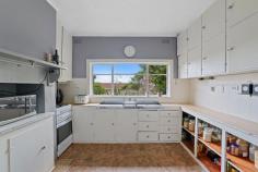 166 Sutton St Warragul VIC 3820 $689,000 An outstanding opportunity to purchase this long held property offering position, price and potential. With over 27 metres of frontage and over 43 metres in depth, the 1184m² allotment is indeed a sizeable parcel of land. Perched well back from the street and occupying a central position, the captivating cream brick veneer residence exudes charm with its original features and décor. With feature front glass entry door, an inspection of this timely classic will reveal size and space with well proportioned rooms. Internally you will appreciate 3 sizeable bedrooms, all with built in robes, North facing living arrangement with double doors and ornate cornice, expansive family room with split system, original eat in kitchen with gas stove, bathroom and two toilets. Ducted gas heating, high ceilings and timber flooring are also notable features. Further complimenting this property is a 4 car garage, extensive off street parking and private garden surrounds with huge expanse of open lawn area. With schools, park land and medical facilities in close proximity, this rarely available property presents a great opportunity to purchase a home located in a respected era.