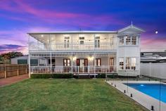 77 Corfield Street Point Vernon QLD 4655 $1,295,000 - $1,350,000 This thoughtfully renovated, character home offers warmth, charm, and striking street appeal and has been maintained in a way to preserve its original charm whilst catering to all the modern comforts you could desire. As you enter this character filled home you will be greeted with a clever combination of yesteryear and a classic, contemporary renovation which will surprise at every turn. The charming interior showcases a well thought out combination of original character features and stylish, modern updates. The property features include high ceilings throughout, original hardwood timber Fraser Island timber flooring, tongue and groove wall panels, decorative fretwork and stained glass and has been meticulously restored for the new owners to move in and enjoy. Positioned only a short 250m from pristine Point Vernon foreshore and Esplanade, this coastal inspired home has been thoughtfully constructed to create balance and harmony with a strong focus on comfortable beachside living. Features include: Beautiful character home which has been thoughtfully renovated throughout Versatile wrap around verandah which overlooks pool and adjoins main living via French doors Open plan living, dining and kitchen with air-conditioning Quality kitchen with stone benchtops, island bench, walk in pantry, dishwasher and 90cm Smeg freestanding electric oven with gas cooktop Separate bar area which adjoins a second living zone with bay window and built in seating Downstairs bedroom with built in wardrobe Spacious internal laundry room with external entry near garage - ideal for use as a mudroom or drop zone Bathroom to service lower level Timber internal staircase to upper level Upper central activity zone or study area Master bedroom with air-conditioning, ensuite bathroom and walk in wardrobe/ dressing room Three additional bedrooms upstairs, all with direct balcony access via French doors, air-conditioning and built in wardrobes Family bathroom upstairs with separate toilet Large walk-in linen cupboard Upstairs wrap around verandah which mirrors the lower level and captures ocean glimpses Double garage at rear with automatic lift door Sparkling inground magnesium pool Solar hot water Easy care, established gardens 660m2 fully fenced allotment with side access Beach access is only a few moments' walk from your door, where you can enjoy peaceful walks along the coast. Local restaurants, cafes and shops are within a short distance. An easy drive takes you to all other major amenities, where you have access to public & private hospitals, Hervey Bay Airport, Stockland Shopping Centre and much more.