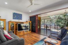 2417 Pine Creek - Yarrabah Road East Trinity QLD 4871 $895,000 Patrick Kenny proudly introduces a golden opportunity to escape the hustle and bustle of city living and have a second income as well. Huge outside tiled patio, stunning resort size pool completed with a spa seat and waterfall. All up approximately 340m under roof, 30mins to Cairns MAIN RESIDENCE • Three extra large bedrooms all with built in robes, the master bedroom with an ensuite, louvre windows and sliding doors to the timber deck with sea views • The living area has timber look vinyl planks as flooring, sliding doors open out to the second timber deck with views of the native trees and sea views • The kitchen is well appointed with wide fridge space, pantry, dishwasher, gas cooktop and plenty of servery area • Internal laundry with extra space, three door linen robe • 4.8 klw solar panels plus solar hot water • Crime safe mesh on all doors, wired for a generator • Air conditioned throughout, tinted windows • Color bond roof, remote sliding gate entry to both residences SECOND RESIDENCE/GRANNY FLAT • A neat tidy kitchen • Two generous sized bedrooms with air conditioning, one with built robes • Tiled throughout the home • For all your business or study needs there is an office room • Air conditioned in the main living area • Separate laundry from the main residence