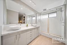 2 Ginsburg Turn Tapping WA 6065 $900,000 This stunning 4-bedroom, 2-bathroom masterpiece is simply in a league of its own! Lovingly renovated & improved by the current owners to create a home that provides space & comfort for all the family; here is your chance to snap up a property that is ready to move straight into & enjoy. Features & benefits include: • Timeless front elevation with established landscaping • Verandah leading to double door entry • Crimsafe security screens • Entrance hall • Master bedroom suite with twin walk-in robes, ceiling fan, reverse cycle a/c, and luxury ensuite with twin vanities, double showers & separate WC • Home office / bed 5 / nursery (currently utilised as a home beaty salon) with reverse cycle a/c & sink with hot & cold water • Amazing home theatre with ‘star’ fibre optic ceiling; screen & projector included • Open plan family & meals areas with ceiling fan & double sliding doors to alfresco • Stunning kitchen with stone benchtops, feature lighting, walk in pantry, shoppers’ access from the garage & stainless-steel appliances including 900mm oven, gas cooktop, extractor & dishwasher • 3 further bedrooms all with double sliding door robes, ceiling fans & 2 with reverse cycle a/c • Family bathroom with shower, bath & vanity • Renovated laundry with walk in linen press, feature LED lighting, WC & sliding door to outside with crimsafe security screen Outside features: • Amazing alfresco with honed, exposed aggregate flooring, built in outdoor kitchen with BBQ & sink, electric heater, ceiling fan, built in speakers & ducted evaporative a/c & café blinds • Sparkling below ground pool with honed, exposed aggregate, outdoor shower & frameless glass pool fencing • Established, low maintenance gardens with lawn area, citrus trees, palms & frangipanis • Garden shed Extra Features: • Skirting boards • CCTV • Drop down attic ladder • Bore reticulation • Evaporative air conditioning • Double remote-control garage with extra height for 4WD’s • Large 606sqm corner block Located close to parks, schools, transport links & all local amenities, buyers are urged to act quickly to secure this stunning property.