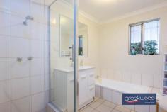 Unit 3/35 Loton Ave Midland WA 6056 $499,000 Tucked away at the rear of a small 3-unit complex, this expansive and well-presented property offers the best of both comfort and convenience. With a generous layout, seamless indoor-outdoor flow, and a prime location within walking distance of Midland’s many services and attractions, this home is a standout choice for first-time buyers or savvy investors. 3 bedrooms 1 bathroom Brick and tile rear unit Multiple living zones Flowing open-plan layout Generously proportioned Small no-fee strata complex Outdoor living/entertaining Single-car carport and shed 464 sqm gated block Flexible living/investing Step inside to discover spacious interiors designed with a flowing, functional layout that suits modern living. The expansive outdoor area provides plenty of space for entertaining, relaxing, or creating your ideal garden retreat – all while enjoying the privacy of a rear position within the gated complex. A single carport and small garden lead to the unit’s front door, which opens to a bright, airy family room with carpet underfoot, reverse-cycle air conditioning, and an adjoining formal dining room. The dining and family rooms wrap around to an open-plan kitchen and meals area, with a sliding door leading to a large, covered alfresco entertaining area and the home’s south-west corner. The sense of space created by multiple living zones, generous proportions, and a flowing floor plan is impressive. The kitchen is defined by a U-shaped bench and an integrated breakfast bar. It has an electric oven and hotplates and boasts ample built-in storage. The adjoining meals area will comfortably accommodate a family-sized table, and its seamless access to the alfresco entertaining area would make an excellent informal living space. The property boasts three carpeted bedrooms, the principal with a vast walk-in robe and the junior rooms with built-ins. A powder room, a family bathroom – with a tub, shower, and vanity – and an ensuite adjoining the principal bedroom ensure no drama as everyone gets ready in the morning. A large, covered entertaining zone with space for alfresco dining and entertaining is sheltered at one corner of the home. Surrounded by a sizeable backyard and accessible via a side gate, this unexpectedly generous space awaits transformation into a garden oasis. A sliding door from the formal dining room to the backyard ups the indoor-outdoor potential of this unit. This property isn’t just a home; it’s an opportunity. Whether you’re stepping into homeownership or looking to expand your investment portfolio, this unit’s size, location, and presentation make it a compelling choice.