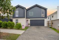 36 Greentree Street Narangba QLD 4504 $999,990 Discover a truly one-of-a-kind home, where luxury meets thoughtful design. This stunning 3-bedroom residence boasts high ceilings and a spacious open-plan layout, creating a light-filled haven of modern elegance. Key Features Include: Three Bedrooms, All with Ensuites, Air Conditioning & Walk-In Robes: A rare find offering privacy and comfort for every member of the household. Open-Plan Living: Seamlessly connect the kitchen, dining, and living areas, perfect for entertaining or relaxing. Gourmet Kitchen: Adorned with pendant lights hanging over a large island bench, complete with a butler’s pantry for added convenience and storage. Upstairs Retreat: Featuring two bedrooms, each with ensuites, a study nook, and a rumpus area for quiet moments or family fun. Downstairs Comfort: Includes the master suite with ensuite, double garage, separate powder room, laundry, and ample storage. Indoor-Outdoor Flow: Sliding doors bathe the living spaces in natural light and open to a concreted alfresco area, ideal for enjoying outdoor dining or a morning coffee. This custom-designed home is a showcase of timeless elegance and functional luxury.