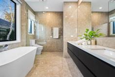 2/25 Park Close Vermont VIC 3133 This elegant home, rich in character, offers an exceptional lifestyle with its polished timber parquetry floors, sleek white kitchen, and luxurious bathrooms. Featuring four generously sized bedrooms and 3.5 bathrooms, the residence maximizes space with discreet custom cabinetry for added storage. At the heart of the home is the kitchen, highlighted by a waterfall-edge stone breakfast island, ideal for meals and socializing. The kitchen is a chef's delight with two ovens, gas cooking, and a walk-in pantry. A convenient powder room and laundry enhance the functionality of the main level. The inviting lounge area, bathed in natural light from high-set windows, creates a warm atmosphere. Step outside to the paved alfresco area for entertaining or the fully fenced lawn, perfect for children and pets. The main bedroom on the main level offers tranquility and privacy with an ensuite, walk-in robe, and direct garden access. The ensuite features a freestanding tub, twin sinks, and generous mirror and storage space. Upstairs, three additional bedrooms share a retreat/rumpus room and a family bathroom with a separate powder room. Bedroom two on this level includes an ensuite with a twin vanity. Completing the property are low-maintenance gardens, a garden shed, and a double garage with internal and rear yard access. Located in a quiet, tree-lined cul-de-sac off Canterbury Road, the home is conveniently close to parks, primary schools, shopping, Eastlink, and public transport. This residence is the perfect combination of luxury and practicality. Highlights: 4 generously sized bedrooms 3.5 bathrooms Discreet custom cabinetry for additional storage Two ovens, gas cooking, and walk-in pantry Convenient powder room and laundry on the main level Access to paved alfresco area for entertaining Fully fenced lawn, ideal for children and pets Close to parks, primary schools, shopping, Eastlink, and public transport