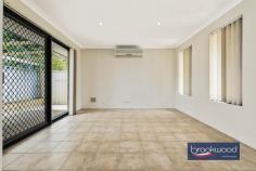 Unit 4/3 George St Midland WA 6056 $499,000 Nestled behind a secure gate, this rear villa exudes warmth and charm, offering an open-plan layout with distinct lounge and dining areas, 3 spacious bedrooms, 2 modern bathrooms, and a private paved courtyard complemented by a gabled patio. Brick & tile villa built 2003 3 bedrooms, 2 bathrooms Spacious 130 sqm villa Rear positioning Reverse cycle air conditioning Secured gated complex Single garage w roller door Paved courtyard with patio Privately managed strata Well balanced for easy living Upon entry, you’re greeted by a small entrance space that leads to a tiled, open area seamlessly connecting the living room, dining area and kitchen. The space is bright and airy, enhanced by natural light streaming through the dual sliding glass doors. The distinct separation between the lounge and dining areas enhances the sense of space and dimension. The kitchen features an L-shaped bench design with ample cabinetry, a pantry, gas and electric cooking options and space for a fridge. It also boasts the convenience of a dishwasher, making it both functional and stylish. Windows at the front of the unit allow plenty of natural light and provide a pleasant view. Down the upgraded, well-lit hallway are three bedrooms – each equipped with built-in robes and split system air conditioners for year-round comfort. The generous master bedroom includes an oversized built-in robe with mirrored doors and an ensuite with a vanity, shower and toilet, creating a fresh and spacious retreat. The main bathroom caters to the whole family, offering a shower, a separate bathtub and a separate toilet. The functional laundry area is conveniently tucked off the hallway, with a sliding glass door leading to the rear courtyard for easy access. The outdoor space is simple yet versatile, with the majority – paved. It offers future gardening possibilities for green-thumb enthusiasts. The private courtyard, accessible via a side gate, is perfect for entertaining under the gabled patio, with dual sliding glass doors connecting the outdoor and indoor spaces. An additional side area serves as a practical utility space, ideal for storage or drying laundry. The single car garage features an automatic roller door and internal shoppers’ access, ensuring convenience regardless of the weather. There’s also an internal storage room inside the garage accessible from the courtyard, providing ample storage options. Currently tenanted until March 2025, this villa appeals to both investors and home seekers, with a reliable tenant in place and a privately managed strata between owners. It presents a fantastic investment opportunity with the flexibility to nest in the future.