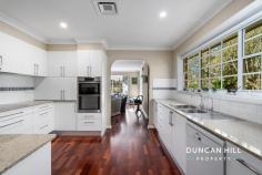 37 Hurlingham Ave Burradoo NSW 2576 $2,600,000 Close to prestigious schools and surrounded by beautiful grounds adorned with deciduous trees, this wonderful family home on Hurlingham Avenue is ready for its new custodian. With its spacious layout and convenient location—just a short drive away from local shops, cafes, and the vibrant town centre of Bowral—this property offers a unique opportunity for families yearning for space in the highly sought-after suburb of Burradoo. Boasting four bedrooms, two bathrooms, and ample living spaces, this home provides a comfortable and versatile layout for family living. The generous rooms allow for easy entertaining and offer plenty of space for relaxation and family time. Whether entertaining guests or enjoying a quiet night by the fire, this home caters to all your lifestyle needs. Contact us today to arrange a private inspection and discover Southern Highlands living at its finest. Features include: Gas log fireplace Lennox gas-assisted heating and air-conditioning Two living rooms and a formal dining room Full-size tennis court Main bathroom with separate water closet and bath Master bedroom with walk-in wardrobe and ensuite Back to base security system Fully fenced backyard Detached double garage with automatic doors Circular drive
