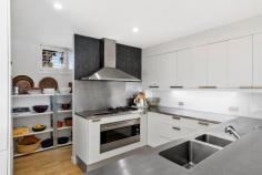120 Charles Avenue Minnamurra NSW 2533 $5,800,000 - $6,200,000 Discover the ultimate coastal haven in one of the South Coast's most coveted waterfront locations, with Title extending to the High Water Mark. This beautifully renovated home blends timeless charm with contemporary coastal living, offering a serene escape just steps from the Minnamurra River and the stunning Mystics Beach, where the Pacific Ocean meets the Minnamurra shoreline. Swimming, snorkeling, fishing and a boat at your doorstep. All of this just 5 minutes from Kiama, 1.5 hours from Sydney and 40 minutes to the Southern Highlands. Step outside to expansive teak decks and manicured lawns that lead directly to the water's edge. This unique property offers breathtaking views from both the home and its outdoor areas, spanning the river, Stack Island, Killalea State Recreation Area, and the ocean. Key Features Include: • Boatshed on the water's edge: A rare feature with extensive teak decking and steps leading to pristine water, where high tide reaches a depth of 1.5 metres. • Expansive Gardens: 1,018sqm (approximately) of mature, landscaped gardens featuring flowering natives, hedges, and cascading star jasmine along stone retaining walls. • Private Location: Situated on the absolute waterfront section of Charles Avenue, away from public access and boat ramps, ensuring peace and privacy. • Spacious Open-Plan Living: Relaxed coastal living with large doors and sun filled areas that seamlessly blend indoor and outdoor spaces. • Cook's Kitchen: A well-appointed kitchen featuring stainless steel benchtops, a walk-in pantry and views to the water. • Master Suite: The upstairs master bedroom includes stunning views of both the river and the ocean. Two additional bedrooms complete the upper level. • Modern Conveniences: Equipped with high-speed NBN Fibre to the Home (FTTH) connection, gas ducted heating, air con, irrigation system with bore water pump. • This exceptional property has been thoughtfully designed to harmonize with its natural surroundings, providing a perfect sanctuary where you can observe native birds, marine life, and the tranquil beauty of Minnamurra. Available for the first time in 35 years, this stylish retreat with absolute waterfront privacy is a rare opportunity to own a piece of tightly held Minnamurra. Further, this property is one of only 22 lots with Title to the High Water mark and one of 6 with an original boatshed on the water's edge.