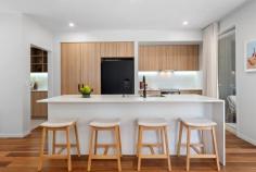 519/33 Kersley Road Kenmore QLD 4069 Welcome to Habitat on Kersley - a remarkable collection of townhomes with exclusive bushland grounds. Designed by architects Fulton Trotter, this beautiful townhome offers exceptional living just 12-kilometers from Brisbane's CBD. Maximising its location with floor-to-ceiling glass in its main living spaces, this property is intentional in its celebration of its surrounds. For the seasoned entertainer, this home boasts a chef's kitchen with Bosch appliances and a butler's pantry, its floorplan flowing from the internal dining space to the covered alfresco with ease. Accommodation includes three bedrooms, the primary suite offering a private ensuite, while comprehensive appointments include a double garage, guest powder room, high ceilings, air conditioning and ceilings fans throughout. Positioned within the well-regarded suburb of Kenmore, this property is perfect for families, offering schools within walking distance. Local amenities include Kenmore Village and Indooroopilly Shopping Centre, while public transport options include nearby Indooroopilly Station. Inclusions: Superb main living space with floor-to-ceiling louvres Open plan dining room, flowing to covered timber deck Chef's kitchen with stone countertops & butler's pantry Primary bedroom with ensuite and built-in robe Two additional bedrooms, each with built-in robes Luxurious family bathroom with bathtub High ceilings, split system air conditioning and ceiling fans Double remote-control garage Internal laundry facilities Low maintenance terraced garden Walking distance from Goodstart Early Learning and Kenmore South State School Minutes from Our Lady of the Rosary School and Kenmore State High School Moments from Kenmore Village Shopping Centre and Indooroopilly Shopping Centre Just 12kms from Brisbane CBD with public transport options including bus and rail