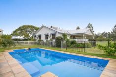 584A Bruxner Hwy South Gundurimba NSW 2480 $1,550,000 Central location 10 mins Lismore, 20 mins Casino, Ballina, Evans Head beaches and Ballina Gateway Airport within 40 minutes.’ The residence is accessed by a long sealed driveway to a secluded elevated position on the property overlooking the Wilson River. Features two spacious bedrooms with ensuite and walk in Robe to main plus smaller third bedroom and study. Fully renovated kitchen includes 5 burner gas range, stainless hood and dishwasher. Large open plan lounge and dining area with open fireplace, the main bathroom includes separate bath and shower, polished floor boards and high ceilings all add to the homes appeal. The living areas flow onto open entertaining verandas taking in the river views, established gardens and In-ground swimming pool. The original dairy has been converted to additional separate guesthouse accommodation and is presently used as a successful Bed and Breakfast operation featuring two spacious rooms both having access to private decks, quality bathroom fit out including frameless shower. An outdoor claw-foot bath, takes in the garden view. Separate massive machinery shed/workshop has lockup storage and concrete floor with open undercover farm implement storage space. Additional caravan accommodation has been implemented and includes kitchen, small back porch taking views over the farm and an outdoor shower has been added. Set on 28.4ha, includes a 12ha T-Tree enterprise almost ready for registered organic status, the riverbanks have undergone major tree regeneration with over 40,000 trees planted around riverbanks and boundaries incorporating nature walks, erosion control and wildlife reserve and Koala corridors