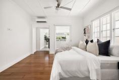 38 Stuart Street Bulimba QLD 4171 This exceptional family home, a masterful transformation of what was once a charming cottage, now exudes grand proportions, timeless elegance, and a sophisticated street presence. Meticulously renovated in recent years to the highest standards, it seamlessly blends traditional character with modern functionality, offering the perfect sanctuary for family living. Nestled in one of Bulimba's most coveted streets and overlooking the iconic Memorial Park, this residence is just 200m from the vibrant Oxford Street and 800m from the CityCat terminal, ensuring effortless access to the CBD. The property's fusion of classic charm and contemporary design makes it a true blue-chip offering, ideal for growing families seeking both style and convenience. Behind an automatic gate, the home is introduced by a white picket fence that guides guests to the front door. Inside, a spacious, open-plan kitchen, living, and dining area greets you with abundant natural light and flows seamlessly onto a large covered timber deck via bifold French doors - an entertainer's dream. The farmhouse-style kitchen with an oversized island bench has hard-wearing bamboo floors, high-end fixtures, and a view of the expansive backyard, ideal for children's play or family gatherings, with ample space for a pool. Accommodation is generously spread over two levels. The lower level features an air-conditioned bedroom with a ceiling fan and an adjacent bathroom, suitable for guests. A wonderfully appointed laundry features a Robinhood Ironing module, generous cabinetry and a chute leading from the primary suite. With direct outdoor access this an ideal mudroom entry for school bags. The upper level is dedicated to the private quarters, with three well-sized bedrooms, three bathrooms and a versatile second living area or potential fifth bedroom/office. The two rear rooms open to a large, covered deck, providing an elevated outlook and seamless connection to the outdoors. To the front of the home, the voluminous primary suite is a true retreat, featuring a private deck with park views, an ensuite with a double shower and vanity, and a walk-through wardrobe. Original features such as hoop pine flooring, high ceilings, VJ walls, and French windows are preserved throughout, further enhancing the home's charm and elegant authenticity. The sprawling home offers an abundance of storage throughout, in addition to a double carport and an air-conditioned garage with soaring ceilings, surfboard and bike racks, a built-in workshop bench, and a television mount-a truly enviable "man cave." Meticulously updated and thoughtfully designed, this home boasts an array of modern amenities, including complete rewiring, a Back2Base security system, a 6.6kW solar system, 16kW battery storage, a 5kW Fronius Gen24 inverter, and three-phase power-ensuring both practicality and energy efficiency. Ideally located, this residence is just a short stroll to Oxford Street's cafes, boutiques, Woolworths, cinemas, and within walking distance of Bulimba State School, Bulimba Library, and the CityCat ferry to Teneriffe. The park across the street provides a serene setting for relaxation or outdoor play, while the nearby playground is perfect for younger children. Features: + Fully renovated and extended character home with authentic period charm + Four spacious bedrooms in total, plus a separate upper lounge offers potential fifth bedroom + Primary suite with private deck, park views, double shower ensuite, and walk-through wardrobe + Four bathrooms in total, including an original clawfoot bathtub and hexagonal tiles + Expansive open-plan kitchen, living, and dining area flowing onto a covered outdoor deck + Large covered timber deck on the upper level with an elevated outlook and TV connection + High ceilings, VJ walls, hoop pine flooring upstairs, and French windows + Falcon Professional Dual Fuel Range Cooker with Teppanyaki plate + Farmhouse fluted porcelain kitchen dual-sink and drain plate + Renaissance English mixer tapware + Built-in cabinetry in living room, under-stair storage, upstairs storage + Air-conditioning, ceiling fans, and louvered windows for natural ventilation + Freshly repainted interiors and new blinds throughout + Secure double carport, air-conditioned garage with built-in workbench + Full rewiring, 6.6kW solar system, 16kW battery storage, and Back2Base security + Directly across from Bulimba Memorial Park + 200m to Oxford Street, and walking distance to cafes, shops, and the CityCat ferry.