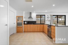 7 Carosa Rd Tapping WA 6065 Tapping’s Most Trusted Agent proudly presents this stunning 4-bedroom, 2-bathroom residence featuring views to Lake Joondalup. Features & benefits include: * Private front garden with modern slatted fencing & gate * Liquid limestone, synthetic lawn & verandah area to watch the sunset colours in the sky * Entrance hall * Formal lounge / home theatre * Master bedroom with ceiling fan & walk in robe, ensuite featuring shower, vanity & WC * Huge open plan family, meals & games areas * Spacious kitchen with new stone benchtops, stainless steel appliances including gas cooktop, electric oven & dishwasher, recessed sinks, space for fridge freezer & shoppers access from the double garage * 3 further spacious bedrooms with ceiling fans; 2 with walk in robes & 1 with built in robe * Family bathroom with bath, shower & vanity * Laundry with walk in linen / storage cupboard * 2nd WC * Brand new blinds * Freshly painted * Alarm * Solar electricity system * Huge wrap around under cover entertaining area * Large back garden with brand new synthetic lawn & plenty of room for a pool * Block paved drive providing plenty of parking for cars, boat, caravan, trailer etc * Low maintenance landscaping * Automatic reticulation * Double remote-control garage with door to patio * Large 608sqm block * Close to transport, schools, parks, shops & all other local amenities This stunning property is ready to move straight into or add to your investment portfolio.