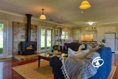 510 Macclesfield Rd Macclesfield SA 5153 $2,500,000 - $2,650,000 Idyllic Living on 13 Acres: Craftsman built Homestead with Breathtaking Views Perched in an elevated position, this custom-designed and craftsman-built Australian farmhouse is a true architectural masterpiece. Set on 13 acres of lush pasture, it offers a lifestyle of charm, elegance, and breathtaking beauty. This four-bedroom home boasts an impeccable design with 9ft ceilings, large double-hung windows, and French doors that flood the interiors with natural light. At its heart lies a charming kitchen and family zone featuring 2pac cabinetry, a granite island bench, and top-of-the-line appliances. A beautiful wood fire completes the inviting space, making it perfect for intimate family moments or quiet evenings. Sydney blue gum hardwood floors add timeless sophistication throughout, while the wraparound verandas provide the ideal space to sit back, relax, and take in the stunning scenery. Whether it’s savouring your morning coffee or enjoying breathtaking sunsets, this home is a sanctuary of peace and tranquillity. When it comes to entertaining, the alfresco area is the star attraction. Seamlessly blending indoor and outdoor living, it’s perfect for hosting gatherings, surrounded by the serene beauty of the property’s elevated outlook. The external features further elevate this exceptional lifestyle offering: 1.A four-car garage with an adjoining workshop and storeroom provides ample space for vehicles and tools. 2.An impressive American-style barn (11m x 10m) with a reinforced concrete slab, ideal for storing caravans, boats, and machinery. 3.Two stables complete with self-watering troughs, rubber matting, and day yards, catering perfectly to equestrian enthusiasts. 4.A wash bay, woodshed, chook shed, and veggie patch offer functionality for a self-sufficient rural lifestyle. 5.Mature trees and hedges, including a variety of fruit trees such as olives, apples, lemons, and limes, enhance the property’s charm. Adding to its allure is a picturesque dam with a jetty, complete with a wood-fired BBQ and picnic table. This peaceful retreat is perfect for family picnics, quiet moments by the water, or entertaining guests while enjoying the tranquil surroundings. With manicured gardens, breathtaking views, and unmatched craftsmanship, this property is truly exceptional. Every detail has been thoughtfully designed to combine elegance and practicality in a serene rural setting.
