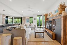 168 N Creek Rd Lennox Head NSW 2478 $2,975,000 Experience the pinnacle of coastal living in this stunning retreat where luxurious spaces blend seamlessly with the tranquility of seaside life. This residence offers every feature imaginable for relaxation, entertainment, and refined living, designed to cater to your every lifestyle need. Ground Floor Haven Step into an expansive, open-plan sanctuary where the kitchen, dining, living, and games areas converge, forming an ideal setting for family gatherings and entertaining. A dedicated home theatre and versatile 5th bedroom or office provide extra flexibility for work and leisure. Three generously sized bedrooms, each with built-ins, offer comfortable accommodations. Two of these share the main bathroom and an informal living room leading to a rear deck, while the third is a secluded retreat with its own private ensuite. Private Parents' Oasis Upstairs, an exclusive parents' retreat awaits. Occupying the entire upper level, it features a luxurious ensuite, spacious walk-in robe, and private balcony with sweeping coastal views. Outdoor Entertainer's Delight The surrounding yard offers an idyllic outdoor space, complete with a corner deck, firepit, and a decked plunge pool-a perfect playground for all ages. Property Highlights -Spacious open-plan kitchen, dining, living, and games area -Contemporary kitchen with a butler's pantry and premium finishes -Separate, expansive home theatre and enclosed study -Three ground-floor bedrooms with built-ins, one with a private ensuite -Informal living room, main bathroom, and inviting rear deck -Upper-level parents' retreat with ensuite, walk-in robe, and balcony -Double lock-up garage with internal access and ample storage -Large yard with corner deck, firepit, and plunge pool -Solar panel and battery system with Tesla fast charger -Located in a peaceful enclave of Lennox Head, 20 minutes from Byron Bay and 10 minutes to Ballina