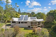 60 Bluegum Court Crabbes Creek NSW 2483 $1,550,000 to $1,650,000 * Nestled within a verdant expanse of 3.9 hectares of pristine semi-rural land, this bespoke three-bedroom sanctuary promises a life of tranquility for those who are attuned to the rhythms of nature. * Crafted by an architect with a deft touch for harmonising European sophistication with the serenity of Japanese aesthetics, this unique dwelling is a testament to the elegance of cultural confluence. * Embrace the warmth and charm of the Tuscan-styled rendered walls that envelop you upon arrival. * The interior is graced with lustrous Australian hardwood floors, featuring the rich hues of Brushbox and Black Butt, adding a touch of rustic opulence to the living spaces. * Every detail is meticulously considered, including the enchanting Japanese shrine "Tokonoma," which provides a space for reflection and appreciation of beauty * The home seamlessly extends outdoors with timber decks, sheltered by generous roof extensions, offering serene spots for morning contemplation or evening soirees amidst the whispering trees. * A formidable 10kW solar system, complemented by 20kWh batteries, ensures substantial savings on energy bills, while a reliable water supply nourishes the land throughout the seasons. * Approximately 80m below the main house, a versatile studio space awaits, with loft style bedroom, perfect for artistic pursuits or a tranquil home office or added income * This property prides itself on approximately 1.4 hectares of regenerated native bushland, including a rainforest and majestic eucalyptus trees, not to mention valuable cabinet timber trees. * Mature trees throughout the property provide sanctuary for a diverse array of birds and wildlife, enriching the land with their presence * Water is a precious resource, and here, sustainability is key. * An operational bore and electrical pump ensure a reliable supply of water all year round, which is stored in two 3,000-gallon tanks perched at the property's peak, offering a gravity-fed water system. * Two natural dams on the estate are a haven for frogs, completing this unique ecosystem * For the cultivator and connoisseur, the land offers 38 varieties of clumping bamboo, with four producing edible shoots, and others ideal for construction and crafting, while some serve to simply embellish the landscape. * A selection of fruit trees, including banana, black sapote, and citrus, flourish here alongside Australian bush foods like Davidson plum, lemon- and aniseed myrtle, and bunya pine. * Those with a penchant for tinkering will find their haven in the substantial shed, complete with room for two cars and a spacious workshop, in addition to an attached carport. * With ample parking space for other vehicles, friends and family can easily visit this countryside retreat. * Whether seeking inspiration from the environment or indulging in the cultivation of the land, this is a rare opportunity to own a piece of paradise. * Escape to a world where nature is your neighbour and peace is your constant companion. * Under 600m to the primary school, general store and post office and under 1km to the Rail Trail.