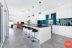 36 Bendeich Drive North Rothbury NSW 2335 Welcome to 36 Bendeich Drive, a stunning 2018 McDonald Jones built family home nestled in the beautiful suburb of North Rothbury. This spacious and modern property offers the perfect balance of comfort and lifestyle, making it the ideal place to call home. Only minutes from Huntlee shopping centre, local schools, parks and within a 4mins drive to the Hunter Expressway and a 15min drive to reach the Hunter Valley Vineyards, this one makes everyday living a breeze! Immaculately presented, this house boasts a generous floor plan with multiple living areas, providing plenty of space for the whole family to relax and unwind. The open-plan kitchen and dining area is the heart of the home, featuring sleek appliances, ample storage, and a breakfast bar for casual meals. The adjoining living room is perfect for entertaining guests or enjoying quiet nights in with loved ones. With four bedrooms, including a spacious master suite with a walk-in wardrobe and ensuite, there is room for everyone to have their own space. The remaining bedrooms are spacious and light-filled, offering built-in wardrobes and easy access to the main bathroom. Ducted air conditioning, high ceilings and plantation shutters throughout are only some of the additional extras this home has to offer inside! Outside, the property continues to impress with a large low maintenance backyard, perfect for children to play or for those who love to entertain. The covered alfresco area is ideal for hosting summer barbecues or enjoying a morning coffee. An additional concreted area is located at the rear of the property that can be used as a second entertainment area or perfect to place a shed on.