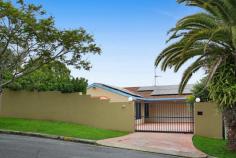 3 Cameron Court Ashmore QLD 4214 $1,150,000 Nestled on a picturesque 899m² block in one of Ashmore's most desirable streets, this charming 3-bedroom home with an additional study offers the perfect blend of privacy, spaciousness, and incredible renovation potential. Positioned on a flat yet elevated site, it boasts breath-taking views of the Gold Coast Hinterland mountains, creating a tranquil backdrop that's hard to find. A grand entrance with two full-size Canary Palm trees and a rendered brick home and fence with electronic gate ensures supreme privacy and maximum land use. Step inside to discover a spacious layout with two large living areas, a family room, and a lounge room, complemented by a generous dining area and a large kitchen that opens seamlessly to a vast undercover courtyard—perfect for year-round entertaining. The courtyard overlooks a sparkling swimming pool and lush backyard, framed by beautiful mountain vistas. The segregated master bedroom features a walk-in robe and ensuite, while the main bathroom impresses with its large size. With ducted reverse-cycle air conditioning throughout, this home promises comfort in all seasons. While this home is ready for a fresh touch, its solid "good bones" make it ideal for buyers eager to renovate and add personal style. Situated just 150 meters from the scenic Nerang River and surrounded by lush parks, this property offers both tranquillity and convenience. Homes like this don't last long—secure your piece of paradise today!