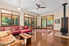 60 Bluegum Court Crabbes Creek NSW 2483 $1,550,000 to $1,650,000 * Nestled within a verdant expanse of 3.9 hectares of pristine semi-rural land, this bespoke three-bedroom sanctuary promises a life of tranquility for those who are attuned to the rhythms of nature. * Crafted by an architect with a deft touch for harmonising European sophistication with the serenity of Japanese aesthetics, this unique dwelling is a testament to the elegance of cultural confluence. * Embrace the warmth and charm of the Tuscan-styled rendered walls that envelop you upon arrival. * The interior is graced with lustrous Australian hardwood floors, featuring the rich hues of Brushbox and Black Butt, adding a touch of rustic opulence to the living spaces. * Every detail is meticulously considered, including the enchanting Japanese shrine "Tokonoma," which provides a space for reflection and appreciation of beauty * The home seamlessly extends outdoors with timber decks, sheltered by generous roof extensions, offering serene spots for morning contemplation or evening soirees amidst the whispering trees. * A formidable 10kW solar system, complemented by 20kWh batteries, ensures substantial savings on energy bills, while a reliable water supply nourishes the land throughout the seasons. * Approximately 80m below the main house, a versatile studio space awaits, with loft style bedroom, perfect for artistic pursuits or a tranquil home office or added income * This property prides itself on approximately 1.4 hectares of regenerated native bushland, including a rainforest and majestic eucalyptus trees, not to mention valuable cabinet timber trees. * Mature trees throughout the property provide sanctuary for a diverse array of birds and wildlife, enriching the land with their presence * Water is a precious resource, and here, sustainability is key. * An operational bore and electrical pump ensure a reliable supply of water all year round, which is stored in two 3,000-gallon tanks perched at the property's peak, offering a gravity-fed water system. * Two natural dams on the estate are a haven for frogs, completing this unique ecosystem * For the cultivator and connoisseur, the land offers 38 varieties of clumping bamboo, with four producing edible shoots, and others ideal for construction and crafting, while some serve to simply embellish the landscape. * A selection of fruit trees, including banana, black sapote, and citrus, flourish here alongside Australian bush foods like Davidson plum, lemon- and aniseed myrtle, and bunya pine. * Those with a penchant for tinkering will find their haven in the substantial shed, complete with room for two cars and a spacious workshop, in addition to an attached carport. * With ample parking space for other vehicles, friends and family can easily visit this countryside retreat. * Whether seeking inspiration from the environment or indulging in the cultivation of the land, this is a rare opportunity to own a piece of paradise. * Escape to a world where nature is your neighbour and peace is your constant companion. * Under 600m to the primary school, general store and post office and under 1km to the Rail Trail.