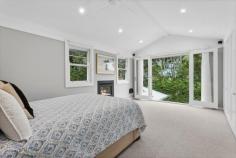 5 Florence Court North Balgowlah NSW 2093 Cushioned within a small cul-de-sac in leafy North Balgowlah, this impeccable family residence is a complete lifestyle sanctuary for families who love to entertain. Achieving a sense of serenity with lush, leafy outlooks at every angle, this home is set amidst landscaped gardens, offering fluid flow to an impressive entertainer’s deck. Thoughtfully upgraded over its lifespan, it features a vast open-plan living zone, a study, elegant modern finishes and oversized proportions. This premium family location features a highly regarded public school, village shops and cafes, whilst more extensive amenities are moments away in Balgowlah and Seaforth. Surrounded by natural beauty, it’s close to Manly Dam and numerous beaches, with easy access to the city thanks to express bus services just one street away. • Double brick and sandstone home with charming original features • Spacious living and dining with two sitting areas, separate study • Perfect entertainer’s layout, seamless flow to protected alfresco space • Enormous entertainer’s deck with hot tub & Argentinian Asado BBQ • Elegant shaker kitchen with huge stone island, Smeg gas cooking • Master bedroom with raked ceiling, Juliette balcony, shower en-suite • All bedrooms are generously sized and feature built-in wardrobes • Family bathroom with under-floor heating, oversized laundry room • Ceiling fans throughout, gas fire in the master bedroom and living • Plantation shutters, brand new wool carpet, limewashed pine floors • Generous under-house and attic storage, driveway parking