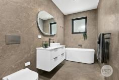 3B Gwawley Parade Miranda NSW 2228 Highlighted by sensational living and poolside entertainment areas, this deluxe brand-new solid home showcases a custom design that provides a spacious family lifestyle of quality, light and versatility. It promises to deliver space and luxury for those who love to live, relax and entertain in easy style, with a low-maintenance indoor-outdoor layout and a range of high-end inclusions. All of this is perfectly complemented by a peaceful street address that's close to local schools, sporting ovals and transport, and just a few minutes to shopping and dining amenities at Miranda Westfield. *Designed for the entertainer with an integration of in/outdoor zones *A spacious and flexible layout offers a generous open plan living area *Cool stone flooring, high ceilings and contemporary décor throughout *An ideal north rear aspect with excellent natural light and leafy outlooks *Sheltered dining patio overlooking a swimming pool and easycare garden *High-end cook's kitchen with stone benchtops and premium appliances *Three upstairs bedrooms, the master has a WIR, luxury ensuite and balcony *Downstairs guest/fourth bedroom with built-in robe and adjoining bathroom *An automatic lock-up garage with internal access plus built-in storage *Daikin ducted air-conditioning system, custom-built wardrobes and great security