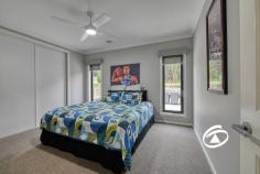 5 Jakobi Court Bunyip VIC 3815 $1,300,000 - $1,400,000 Family Haven on 1 Acre Set on a sprawling 1-acre block, this stunning modern homestead combines luxury living with the charm of country-style tranquility. Located in a quiet, private court, this property offers the perfect blend of space, comfort, and sustainability, making it the ideal choice for those seeking a modern lifestyle in harmony with nature. Offering four bedrooms, each is of generous proportions and feature built in robes and full-length windows with views to the grounds. The primary bedroom distance in design has a walk-in robe and full ensuite bathroom. Central to the design is the stone kitchen with stainless steel appliances and walk in pantry, one can entertain and work seamlessly at the same time. The secondary bedrooms are serviced by a family bathroom. Living areas abound from the formality of the lounge/theatre that can be closed off to the casual and relaxed feel of both the family and rumpus rooms. Each space allows families to gather or retreat. The convenience of ducted heating and split system cooling. The study allows room for one to work from home. A colour filled garden, neatly clipped lawns, together with specimen native trees provide the perfect back drop for kids to roam and room for a future swimming pool. A newly constructed 20x12 m high clearance shed offers four bays, will hold all the toys and more, alternatively one could tinker all day long. Beautifully set, amongst quality housing, the property offers a tremendous platform wanting a semi-rural lifestyle.