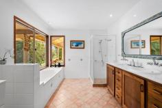 60 Bluegum Court Crabbes Creek NSW 2483 $1,550,000 to $1,650,000 * Nestled within a verdant expanse of 3.9 hectares of pristine semi-rural land, this bespoke three-bedroom sanctuary promises a life of tranquility for those who are attuned to the rhythms of nature. * Crafted by an architect with a deft touch for harmonising European sophistication with the serenity of Japanese aesthetics, this unique dwelling is a testament to the elegance of cultural confluence. * Embrace the warmth and charm of the Tuscan-styled rendered walls that envelop you upon arrival. * The interior is graced with lustrous Australian hardwood floors, featuring the rich hues of Brushbox and Black Butt, adding a touch of rustic opulence to the living spaces. * Every detail is meticulously considered, including the enchanting Japanese shrine "Tokonoma," which provides a space for reflection and appreciation of beauty * The home seamlessly extends outdoors with timber decks, sheltered by generous roof extensions, offering serene spots for morning contemplation or evening soirees amidst the whispering trees. * A formidable 10kW solar system, complemented by 20kWh batteries, ensures substantial savings on energy bills, while a reliable water supply nourishes the land throughout the seasons. * Approximately 80m below the main house, a versatile studio space awaits, with loft style bedroom, perfect for artistic pursuits or a tranquil home office or added income * This property prides itself on approximately 1.4 hectares of regenerated native bushland, including a rainforest and majestic eucalyptus trees, not to mention valuable cabinet timber trees. * Mature trees throughout the property provide sanctuary for a diverse array of birds and wildlife, enriching the land with their presence * Water is a precious resource, and here, sustainability is key. * An operational bore and electrical pump ensure a reliable supply of water all year round, which is stored in two 3,000-gallon tanks perched at the property's peak, offering a gravity-fed water system. * Two natural dams on the estate are a haven for frogs, completing this unique ecosystem * For the cultivator and connoisseur, the land offers 38 varieties of clumping bamboo, with four producing edible shoots, and others ideal for construction and crafting, while some serve to simply embellish the landscape. * A selection of fruit trees, including banana, black sapote, and citrus, flourish here alongside Australian bush foods like Davidson plum, lemon- and aniseed myrtle, and bunya pine. * Those with a penchant for tinkering will find their haven in the substantial shed, complete with room for two cars and a spacious workshop, in addition to an attached carport. * With ample parking space for other vehicles, friends and family can easily visit this countryside retreat. * Whether seeking inspiration from the environment or indulging in the cultivation of the land, this is a rare opportunity to own a piece of paradise. * Escape to a world where nature is your neighbour and peace is your constant companion. * Under 600m to the primary school, general store and post office and under 1km to the Rail Trail.