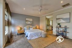 13 Bonneville Parade Pakenham VIC 3810 $690,000 - $759,000 Room for the entire family – you bet! Located in the sought-after Cardinia Lakes Estate, this impressive ex-display four-bedroom home is ready for its lucky new owner. Step inside and discover a spacious, versatile floor plan designed to suit the whole family, with every room thoughtfully positioned for practicality and comfort. The open-plan main living and dining area is perfect for bringing family and friends together, featuring quality appliances, a dual oven, gas cooktop, dishwasher, an array of storage, and a large island bench. Adjacent to this space, a secondary lounge offers flexibility to adapt to your lifestyle needs. The home boasts four well-sized bedrooms, including a master suite with a walk-in robe and a stylish ensuite. The three additional bedrooms include built-in robes and are conveniently located near the central bathroom and a separate toilet. A generously sized study adds further versatility, making it ideal for those working from home or easily convertible into a third living area or a fifth bedroom. Step outside through dual sliding doors to a spacious pergola, perfect for year-round entertaining. Additional features include ducted heating, evaporative cooling, high ceilings, plantation shutters, a large laundry, and a double garage. Perfectly positioned just a short walk from the lake, vibrant shopping precinct, and well-regarded schools such as Pakenham Primary School and Cardinia Lakes Early Learning Centre, this home offers the ideal lifestyle for growing or established families.