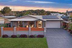 21 Point St Bateau Bay NSW 2261 Step into the ultimate beachside sanctuary at 21 Point Street, located in one of Bateau Bay’s most coveted streets on the sought-after eastern side of Bateau Bay Road. Situated a short stroll from the sand and sea, set 7 house back from the reserve, this beautiful single-level home is an absolute dream for coastal lovers, nature seekers, and holidaymakers alike. Imagine waking up to the fresh ocean breeze, grabbing your morning coffee from across the road, and wandering down to the water’s edge within minutes. Bateau Bay Beach, with its beautiful waters and golden sands, is practically an extension of your backyard. If you love the outdoors, you’ll adore being steps away from Wyrrabalong National Park, where scenic coastal walks, breathtaking lookouts, and an abundance of native wildlife await. With thoughtful revamping, this home radiates a warm, welcoming energy that makes every day feel like a getaway. Light-filled open-plan living spaces, an updated kitchen, and tranquil outdoor areas create the perfect setting to relax and unwind after a sun-soaked day at the beach. Perfect for All Lifestyles: – Beach lovers & surfers – The waves are calling! Grab your board, ski or snorkel and be in the water in minutes. – Nature lovers & hikers – Explore endless scenic trails through Wyrrabalong National Park, leading to hidden coastal gems and jaw-dropping views. – Retirees & downsizers – Enjoy the ease of single-level living in a peaceful, community-focused street. – Families – With great schools, parks, and lifestyle amenities nearby, this is an idyllic place to call home. – Investors & holidaymakers – A prime location for a coastal retreat or a high-demand holiday rental. Features You’ll Love: – Four generous bedrooms with plenty of natural light. – Two stylish bathrooms, underfloor heating and modern finishes throughout. – A spacious, open-plan layout designed for effortless indoor-outdoor living. – Lush tropical landscaping and pebblecrete pool, creating a private, resort-style feel. – Double remote garage with rear roller door access to drying court. – Remote front gate for added privacy and use of garden space. – Minutes to local cafés, restaurants, and boutique shopping. If you’ve been searching for the perfect blend of comfort, lifestyle, and location, 21 Point Street, Bateau Bay, is the one you’ve been waiting for. Whether it’s morning swims, sunset walks along the cliffs, or simply soaking in the serenity of your private oasis, this home offers the ultimate coastal escape.