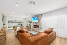 3A Dolan Street Dapto NSW 2530 $990,000 - $1,090,000 Discover the perfect blend of modern elegance and coastal charm in this stunning newly built 4-bedroom family home. Designed for effortless living, it features premium finishes, spacious interiors, and a relaxed coastal aesthetic. The home boasts four generous bedrooms with built-in wardrobes, including a luxurious master suite with a walk-in robe and private ensuite. The gourmet kitchen is equipped with stone benchtops, high-end appliances, and a butler's pantry, flowing seamlessly into the light-filled open-plan living and dining area, which extends to an alfresco entertaining space. Stylish bathrooms with designer fittings, ducted air conditioning, high ceilings, and quality flooring add to the home's appeal. A double garage with internal access provides convenience, while the sought-after location places you just minutes from pristine beaches, local cafes, schools, and parks. Four generously sized bedrooms, each equipped with built-in wardrobes Main bedroom with ensuite and WIR Spacious living and dining areas Stylish main bathroom Stunning kitchen with butlers pantry, 40mm stone benchtops and quality appliances Study nook Internal laundry completed with cabinetry and stone benchtops Large covered alfresco area, ideal for hosting guests Double automated garage with internal access Landscaped yard, plenty of space for the kids and pets to play Situated in a quiet culdesac Moments to the local schools, shops, transport and freeway access