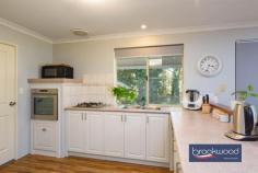 955 Gill St Mundaring WA 6073 $1,499,000 Set on a peaceful street near Mundaring townsite and local schools, this expansive property offers endless possibilities, including the potential to subdivide a 3-acre lot (subject to approvals). The 4-bedroom, 2-bathroom home is designed for family living, featuring three spacious living areas, fresh paint and well-sized bedrooms. Outdoors, the property shines with a huge alfresco entertaining space and an impressive American barn workshop. Subdivision potential for a 3-acre lot (subject to approvals) Close to schools and Mundaring townsite Spacious 4-bedroom, 2-bathroom home Three large living areas Freshly painted throughout Alfresco with TVs, speakers and blinds 144m² American barn workshop with mezzanine Two overhead cranes for heavy lifting and projects High-access roller doors for caravans or boats Neat, tidy and move-in ready Inside, the home provides an exceptional balance of space, functionality and style. With three living rooms, there’s no shortage of areas for the family to relax, entertain or work from home. The freshly painted interiors add a modern, clean feel and the generously sized bedrooms ensure every family member has their own space. The practical layout and neat presentation make it a comfortable and inviting family home that’s ready to move straight into. The alfresco space takes entertaining to the next level, designed with both functionality and style in mind. Wired TVs and integrated speakers ensure the perfect setup for hosting large gatherings or quiet movie nights, while the drop-down blinds create a cozy, intimate atmosphere when needed. This expansive outdoor area is ideal for year-round use, offering a seamless extension of the indoor living space and a true highlight for those who love to entertain. The large American-style barn workshop is a standout feature of the property, catering to a wide range of needs, from hobbyists to professionals. Equipped with two overhead cranes for heavy lifting, high-access roller doors perfect for accommodating boats or caravans, and a 32m² mezzanine for additional storage, this workshop is as practical as it is spacious. Air hoses and ample power outlets are located throughout, making it a fully functional workspace. A separate outdoor wash-down area with its own sump adds even more utility, ensuring this workshop is ready for any project or storage requirement.