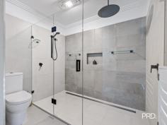 2 Fig Way Caddens NSW 2747 We will be hosting a Friday night launch at 7:30PM for this beautiful home, please register your attendance for catering purposes via Adrian Borg on 0438 856 342 including your name and how many attendees, thank you! Adrian Borg and Cristina Bartuccio from PRD Penrith are excited to present 2 Fig Way, Caddens to the market. Amidst other upscale residences sits this luxurious Adenbrook built 5 bedroom home, only 7 years young and crafted to the finest standards this property is ready to entertain your family and friends all year round. Key Features: - 754m² corner block with side access - Expansive master bedroom suite with 3.1-meter high ceilings, a spacious walk-in wardrobe, and an ensuite featuring a double shower - Three additional large queen bedrooms upstairs, all carpeted, with ceiling fans and built-in wardrobes - Fifth bedroom downstairs with blonde floating timber floorboards - Main bathroom upstairs with a separate tub and shower - Powder room with toilet, vanity, and a large framed mirror - Elegant lounge room with recessed display walls featuring custom black artisan aluminum inserts and a double-sided gas fireplace - In-house ceiling speakers and 2.7-meter ceilings in the lounge - Study ideal for remote work, with 3.1-meter ceilings and a walk-in cupboard for household communications, including security cameras and in-house sound controls for ceiling speakers - Cinema room with surround sound and 3.1-meter ceilings - Contemporary kitchen with 50mm waterfall Caesarstone countertops, a butler's pantry, and an oversized deep farmhouse undermount sink - Four-zone reverse cycle ducted air conditioning throughout - Plantation shutters on all windows - Extra-large 6.6m x 5.8m garage with an automatic door, workspace, custom cupboards, and rear access sliding door - Gas-heated, fully tiled inground mineral/magnesium swimming pool (10m long, 5m wide, 2m deep) - 2.5m x 4m x 1.2m deep gas-heated fully tiled spa with 12 blower jets, accommodating 12 people comfortably - Alfresco area with two gas BBQs, sink, 40mm Caesarstone countertops, bar fridges, fan, electric strip heating, and in-house ceiling speakers - Bi-fold stacking commercial-grade sliding doors from living to alfresco with a full-length retractable flyscreen that includes a lockable custom-designed dog flap - Cabana built in 2021 featuring an enclosed pool motor room with fully automated equipment, a full bathroom with high-end fittings, a remote fan, strip heating, and a sonic sound bar - Landscaped gardens and grassed areas equipped with sprinkler systems in the front and back - Security features including an alarm system, security cameras, and front door intercom - 3-stage dimmable LED downlights throughout - Custom semi-cantilevered steps with a double ceiling void - Ample driveway and off-street parking available - 6.6KW ABB UNO inverter paired with 20 Tier 1 quality solar panels Conveniently Located Near: - Caddens Corner Shoping Centre: 1.1 km - Western Sydney University: 1.6 km - TAFE NSW - Kingswood: 1.7 km - Orchard Hills Light Rail Metro Station (under construction): 2 km - Nepean Hospital: 3.1 km - St. Dominic's College: 4.2 km - Western Sydney Airport (under construction): 16 km Quality, ritzy built homes of this calibre, on such a spacious corner block, featuring a luxurious upmarket, blissful paradise, resort-style backyard are not often available in this region - a true Caddens Jewel!