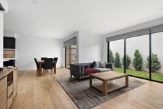 3/108 Fortescue Avenue Seaford VIC 3198 $985,000 - $1,083,500 A genuine work of contemporary art defined by its meticulous craftsmanship and flawless presentation, this near-new 3-bedroom townhome has been carefully crafted to create a sophisticated coastal lifestyle that surpasses all expectations, captivating with its flawless design and exquisite attention to detail. An architectural facade, engineered Oak floors and high square-set ceilings introduce a grand layout with light flourishing into every corner, centred around vibrant living and dining spaces with magnificent integration to its adjacent deck and yard. Refined materiality persists inward, with stone counters over a designer ebony kitchen, where supporting Bosch elements and a walk-through pantry emphasise its enhanced refinement. Dual walls of stacker doors frame private gardens to the rear while extending life to the northeastern deck, welcoming the morning sun with a pergola overhead. The ground floor's main bedroom with a designer ensuite and a fitted walk-in robe provides options for living at all ages, with two additional bedrooms on the upper floor around a vast second lounge and family bathroom. A prudent modern insertion in a quiet coastal pocket echoes the broadening vogue of its location, moments from Kananook Tennis Club and Reserve, Kananook Creek walking trails, Kananook Station, buses, and the beautiful foreshore, with Seaford Village, freeway access, Kananook Primary and Frankston CBD all within a brief drive. Additional features include split-system air conditioning, LED downlights, premium blinds, a full-sized laundry and lower-level powder room, and a double garage.