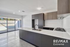 9 Garzoni La Landsdale WA 6065 $729,000 Step into contemporary sophistication with this as-new townhouse in one of Landsdale’s newest and most sought-after developments. Garzoni Lane boasts a sleek, minimalist design with exceptional functionality, perfect for those seeking a stylish and low-maintenance lifestyle. PRIME LOCATION Located in a premium pocket of Landsdale, this modern townhouse offers the best of both convenience and tranquility. Positioned approximately 30 minutes from Perth CBD and Perth Domestic Airport, it provides easy access to: Kingsway Sporting Complex – a hub for sports and outdoor activities Hillarys Boat Harbour – a perfect spot for weekend leisure The Swan Valley – renowned for its wineries and dining experiences Nearby schools, shopping centres, and public transport – ensuring everyday convenience Enjoy the perks of urban living while still relishing the peaceful surroundings. PERFECT FOR A RANGE OF BUYERS Whether you’re a first-home buyer, downsizer, investor, FIFO worker, or empty nester seeking a lock-and-leave residence, this contemporary townhouse is a standout opportunity. PROPERTY FEATURES 9 Garzoni Lane includes: ✔ 3 spacious bedrooms – Bedrooms 2 and 3 are located on the ground floor, while the master suite with ensuite is positioned on the first floor. ✔ 2 stylish bathrooms – Designed with floor-to-ceiling tiles, high-end tapware, and sleek glass shower screens. ✔ Open-plan living and dining – Expansive light-filled spaces with high ceilings throughout. ✔ Modern kitchen – Equipped with stone benchtops, a large oven, gas cooktop, and built-in recesses for microwave and dishwasher. Includes a built-in rangehood, double sink, and a fridge recess. ✔ Quality flooring throughout – Ceramic tiles in main living areas, plush carpets in bedrooms and stairs. ✔ Convenient laundry – Located within the garage, offering ample storage solutions. ✔ Climate control – Ducted reverse-cycle air-conditioning throughout for year-round comfort. ✔ Double garage – Spacious with an under-stair storage recess. ✔ Outdoor spaces – Generously sized areas ideal for entertaining or unwinding, with landscaped front and rear yards. ADDITIONAL INFORMATION Year Built: Completed in 2024 Availability: Vacant possession available Zoning: Residential (Strata) Council: City of Wanneroo Nearby Schools: Landsdale Primary School, Landsdale Christian School, Carnaby Rise Primary School, and Kingsway Christian School Low strata fees: $219.40 per quarter (admin & reserve) as at Jan 2025 This contemporary townhouse is a rare opportunity to secure a stylish and low-maintenance home in a thriving community.