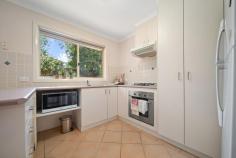 54/42 Lhotsky Street Charnwood ACT 2615 $525,000 Comfy, cosy, and full of charm, this well-maintained townhouse offers the perfect opportunity for low-maintenance living in a peaceful setting. Nestled in the popular 'The Park' complex, you'll enjoy beautifully kept gardens, picnic spots, kids' play areas, and direct gated access to Charnwood shops and transport. Across a single, easy-care level, this townhouse comprises two bedrooms with built-in robes-the main with a walk-in robe-a Jack and Jill bathroom with a bath and separate toilet, and a light-filled open-plan living, dining, and kitchen area flowing to the leafy courtyard. There's plenty of bench space and storage in the good-sized kitchen, featuring a full-length double-door pantry, breakfast bar, gas cooktop, under-bench oven, and space for a dishwasher. Well-presented, freshly painted and with new carpet in the main bedroom, this home is ready for you to move in and enjoy from day one. Additional features include evaporative cooling, gas heating and hot water, a single lock-up garage with internal access and electric door, and a full laundry room with access to the yard. The sunny courtyard is sure to delight, with established gardens and trees for shade and privacy and a paved area perfect for entertaining or simply relaxing with a coffee and enjoying the peaceful surroundings. Everything you need is at your fingertips, with Charnwood shops, cafes, and dining a short stroll away, along with a bus stop connecting you to Belconnen. A selection of schools is close at hand, and with nearby walking/biking paths and easy connection to arterial roads, you're well placed to access all amenities. Whether you're entering the market for the first time or looking to downsize in a comfortable, easy-care home with no stairs, this conveniently located townhouse is a 'must see.' Call today for an inspection. Features - Single-level townhouse in 'The Park' complex Well-maintained, freshly painted, move-in ready 2 bedrooms with built-ins - main with walk-in robe Jack & Jill bathroom with bath + separate toilet Tiled, open-plan living, dining, & kitchen area Kitchen with gas cooktop + ample storage SLUG, internal entry + laundry + linen closet Ducted evaporative cooling + gas heater in living Sunny courtyard with established gardens, trees Walk to Charnwood shops, cafes, dining, buses Easy access to arterial roads, 15 mins to Belconnen Low-maintenance living in a quiet, convenient locale