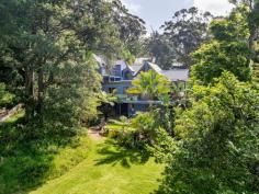9A Murrawal Road Stanwell Park NSW 2508 Every day will feel like a holiday at this resort style family home, nestled amongst the trees. Entertain friends and family, surrounded by native birdlife while the kids play in the adjacent parklands, then take a stroll down to the beach for some sun, sand and swimming. Life doesn't get much better than this. YOUR HOME * Offering a versatile layout with multiple indoor+outdoor living spaces, a free flowing open design and plenty of picturesque areas to escape the outside world. The home is ideal for both hosting friends and family, or kicking back while enjoying the leafy surroundings and sounds of the nearby ocean. * To the east, the property flows directly on to a large grassed parkland. Enjoy all the perks without any of the maintenance, kicking a ball with kids, games of cricket with friends or setting up a picnic blanket and watching the world go by. * Having a literal babbling brook running beside the home completes the picture of tranquility. * Relax on the deck and enjoy your morning coffee or glass of wine whilst taking in the beautiful views and ocean glimpses. * Previously, the property operated as a successful bed & breakfast and is one of the few properties in the area that is licensed to do so. For those looking for a unique business opportunity, look no further. * Generously sized parents retreat boasts a private sitting area, walk-in robe, ensuite and of course a picturesque outlook. It's the perfect place to retreat after a long day. * A large double lock-up garage provides secure parking as well as space to store the boards, bikes and other must-have toys, when living on the coast. * The home has been well loved and well maintained, so there is nothing left to do but move in and start enjoying your new beachside lifestyle. * Positioned on a generous 1,054.5m2 block with R2 residential zoning. YOUR LOCATION * This unique location allows you to walk out the back door and directly down to the beach. * One of Stanwell Park's most popular, being quiet with very little traffic and plenty of friendly long term residents. * Only a moment's stroll to the pristine Stanwell Park beach which is fully patrolled, offers fantastic surf breaks and is dog friendly. * You can leave the car at home as the local cafes, school, shops and restaurants are all only minutes from your front door. * The Royal National Park is situated just 10 minutes drive. * Stanwell Park is located approximately 1 hour South of Sydney CBD and approximately 30 minutes North of Wollongong CBD. * Embrace the quintessential coastal lifestyle and all that comes with it... swimming, fishing, bushwalking, hang gliding and family picnics in popular parklands all available only moments from your doorstep.