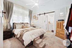32 Milner Parade Quirindi NSW 2343 $675,000 to $695,000 This majestic Federation-style residence at 32 Milner Parade, Quirindi, NSW, is not merely a home-it's a cherished heritage icon within the Liverpool Plains region. Crafted by Mr. Robert Pollock, the artisan behind some of the town's earliest significant structures, such as the original General Store, this property is rich in local history and presents a unique opportunity to own a fragment of Quirindi's architectural heritage. Built in the vicinity of 1912, during the Federation era, the house exhibits the period's signature features, including 12-foot-high ceilings and detailed pressed metal walls and ceilings. It has been lovingly updated to accommodate modern family living, featuring three bedrooms and an additional sleep-out or office space. Set on a spacious 3,097-square-meter plot with three titles, West Lynne offers an elegant entry hall, a formal lounge with fireplace, and a north-facing enclosed veranda for all-season comfort. The master bedroom is complemented by an ensuite, while the expansive kitchen-dining area, equipped with electric oven, gas cooktop, and wood stove, opens to a breezy rear deck, merging tradition with function. The property also includes a single-car garage, a five-bay machinery shed, and a workshop, adding versatility. As a designated heritage site, this residence serves as a sanctuary and a testament to the area's history, perfect for those eager to preserve a part of Quirindi's past while savoring a charming, practical space with picturesque views. Located just two minutes (less than 3km) from town, step into this timeless treasure where each room narrates its story, and each sunset becomes your cherished memory-this heritage home awaits someone to appreciate it as deeply as it cherishes its legacy.