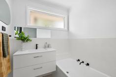 2/107 Yuille Street Frankston South VIC 3199 $630,000 - $690,000 Situated at the rear of only two, this private and sun-drenched home embraces a low-maintenance lifestyle in a coveted FHSZ location, just a stone's throw from Pratt Reserve. Meticulously renovated with heart, it showcases a range of thoughtful upgrades, ensuring a comfortable living experience throughout its bright and airy single-level design. Waterproof Hybrid flooring enhances the practicality of this entire two-bedroom layout, where both sunlit bedrooms maintain their privacy in a peaceful rear position. A designated living room with gas wall heater and exterior access complements a light-filled meals zone, while the adjoining kitchen makes entertaining seamless thanks to all-new electric appliances, stylish timber benchtops, and ample cabinetry including a built-in bar/coffee station. This stylish home boasts a modern bathroom complete with a separate tub and shower, a spacious laundry with external access, a secure rear yard offering ample play space, and a single carport with an adjoining service area. Enjoy convenient access to the Frankston Foreshore via Sweetwater Creek, as well as proximity to Overport Primary and Frankston High School, and reliable public transport options. Ideally located within easy reach of Frankston Hospital, Monash University, and Bayside Shopping Centre.